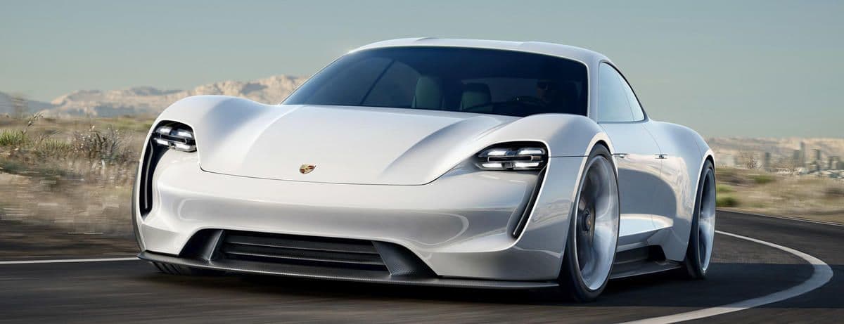 Video: Mark Webber Drives The Porsche Mission E Around Weissach: cover image